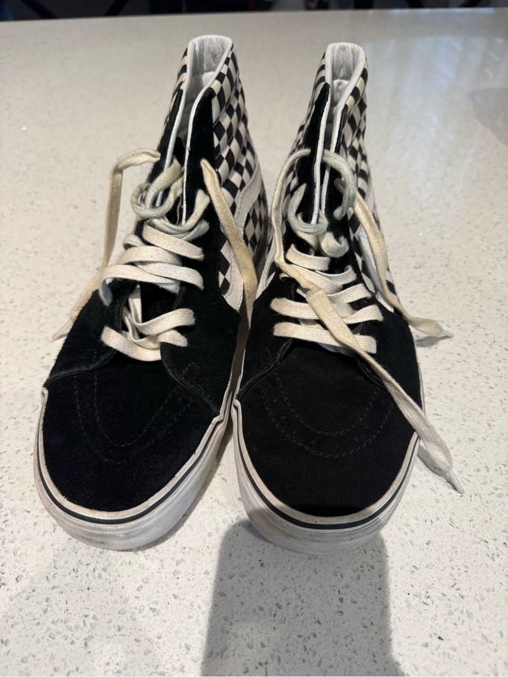 Vans High-Top Checkerboard Sneakers in Black and White